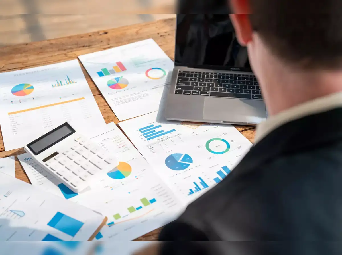 background image of calculator on desk (for a financial advisor)